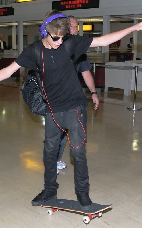 Justin Bieber wearing Louis Vuitton Backpack
